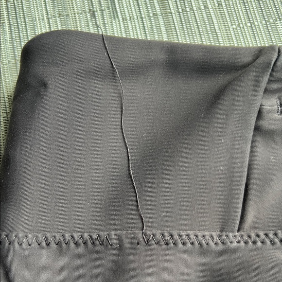 ATHLETA Stellar Tight with Zippered Ankle & Pockets Leggings, Dark Brown - Picture 7 of 8